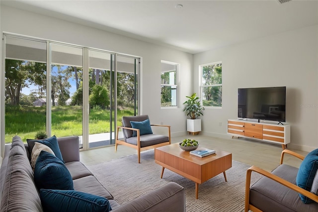 9093 Players Dr, Weeki Wachee, FL 34613 - living area featuring baseboards