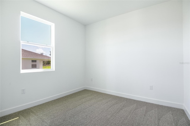 9093 Players Dr, Weeki Wachee, FL 34613 - carpeted spare room with baseboards