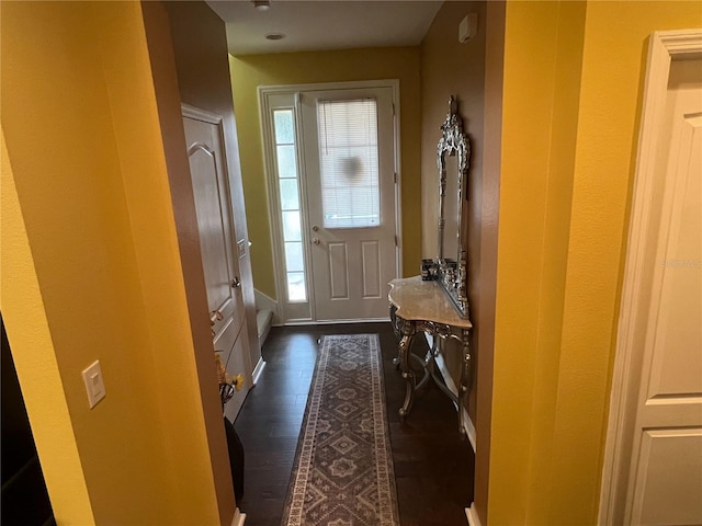 doorway to outside featuring dark hardwood / wood-style floors