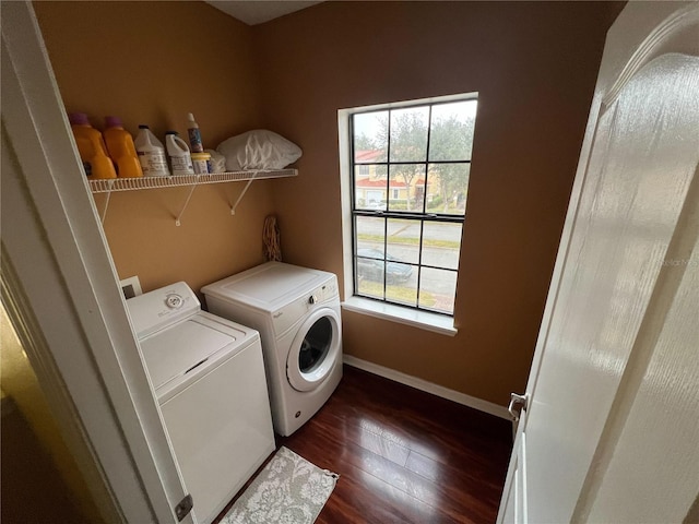 washroom featuring independent washer and dryer and dark hardwood / wood-style floors