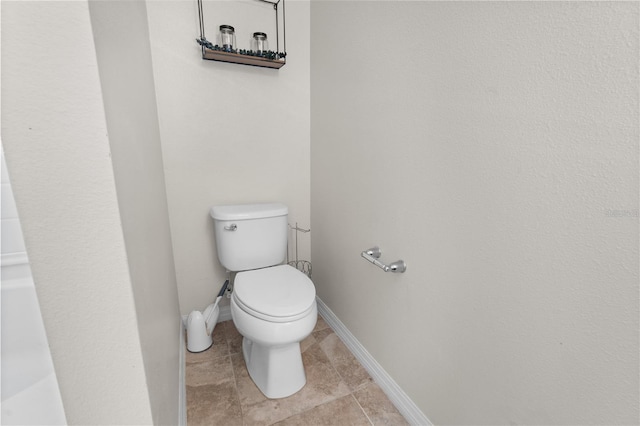 bathroom featuring toilet