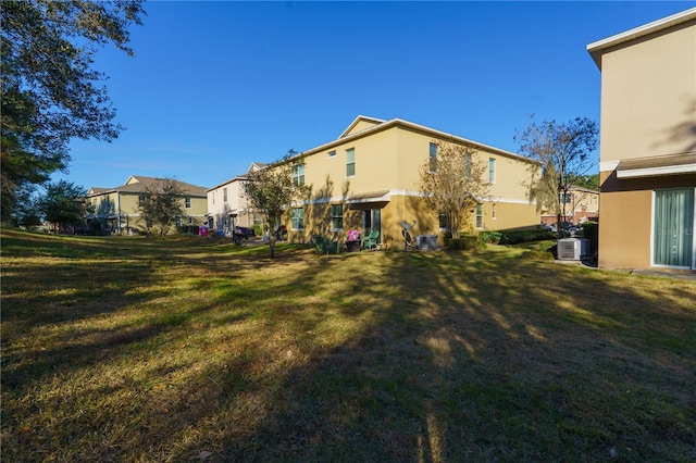 view of yard featuring central AC