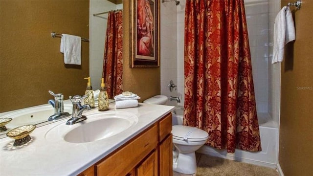 full bathroom featuring toilet, vanity, and shower / bathtub combination with curtain