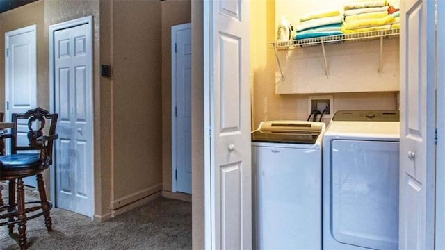 laundry area with carpet floors and separate washer and dryer