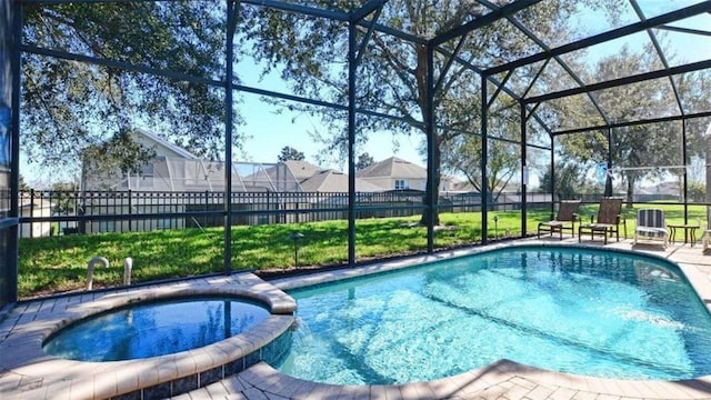 view of pool featuring a lanai, a patio, and an in ground hot tub