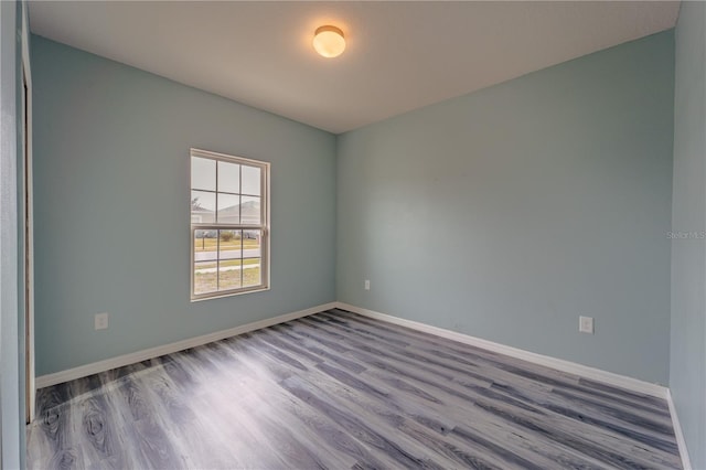 empty room featuring hardwood / wood-style floors