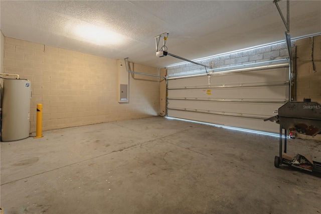 garage featuring electric panel, water heater, and a garage door opener