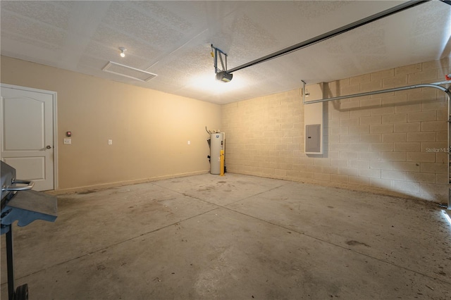 garage featuring electric panel, water heater, and a garage door opener