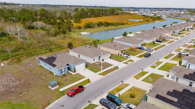 drone / aerial view featuring a water view