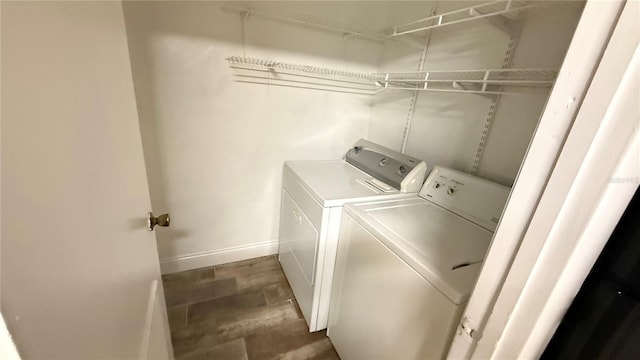 washroom with washer and dryer