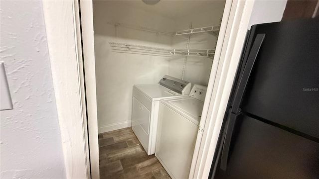 washroom featuring washer and dryer