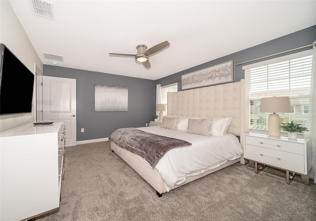 bedroom featuring ceiling fan and light colored carpet