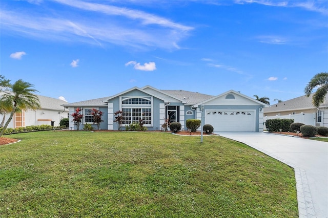 ranch-style home with a front yard and a garage