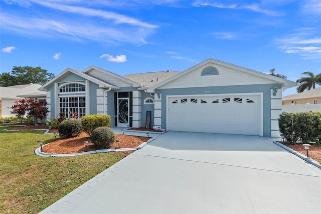 ranch-style home with a garage and a front yard