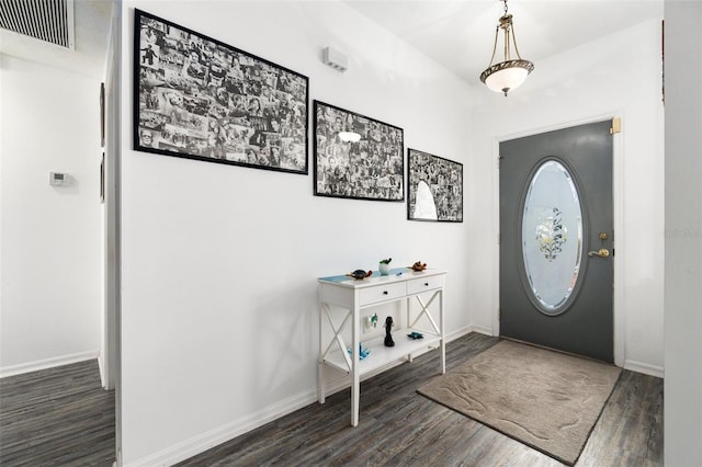 entrance foyer with dark hardwood / wood-style flooring