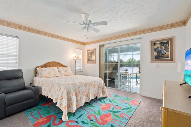 bedroom featuring ceiling fan, a textured ceiling, access to outside, and carpet flooring