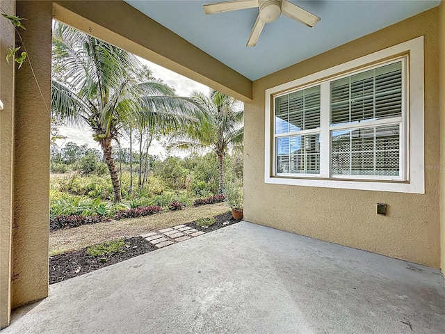 view of patio / terrace featuring ceiling fan