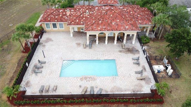 view of pool featuring a patio