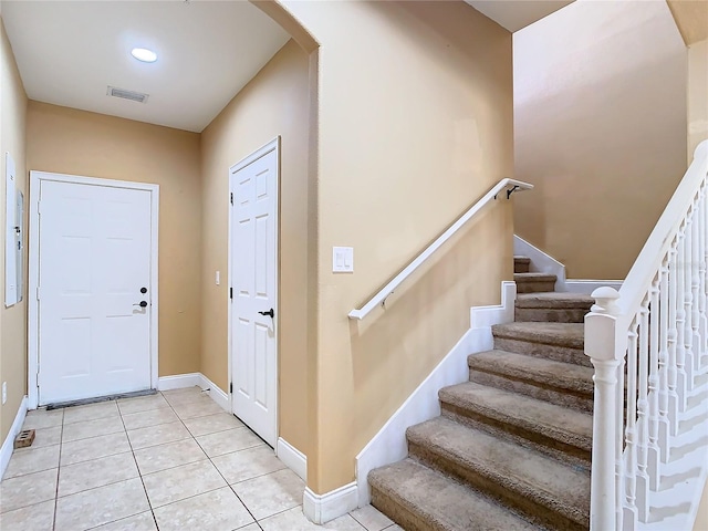 view of tiled entrance foyer