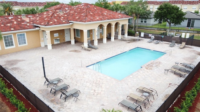 view of swimming pool featuring a patio