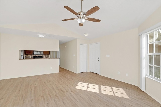 unfurnished living room with light hardwood / wood-style flooring and ceiling fan