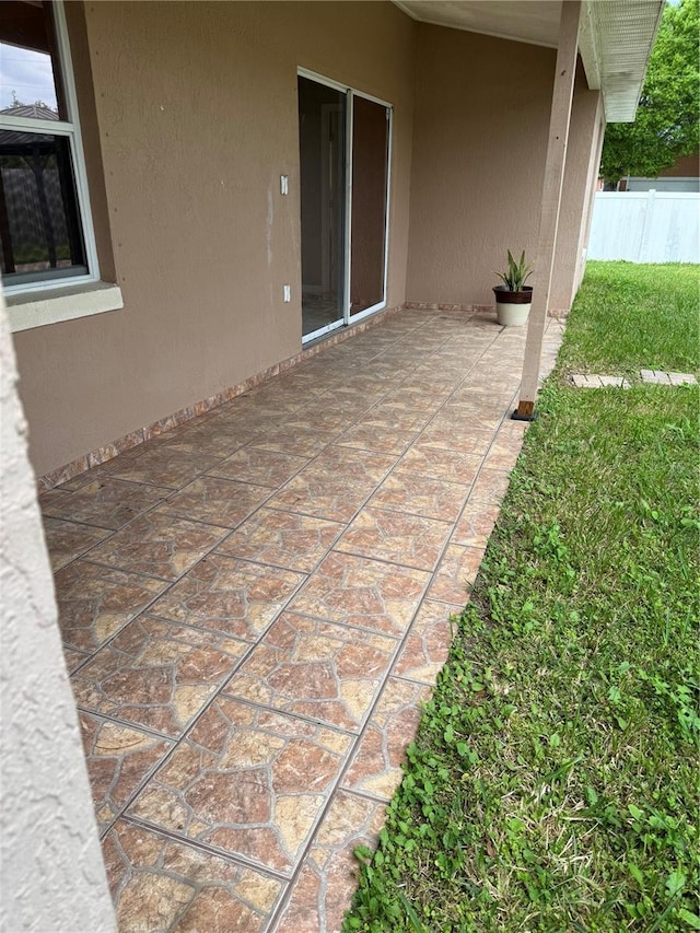 view of patio with fence