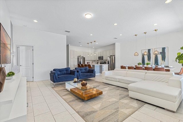 living room featuring light tile patterned flooring