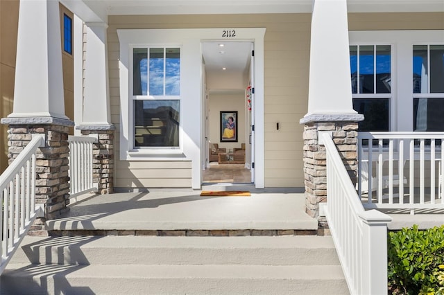 property entrance featuring covered porch