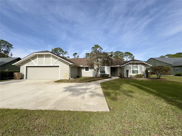 ranch-style house with a garage and a front lawn