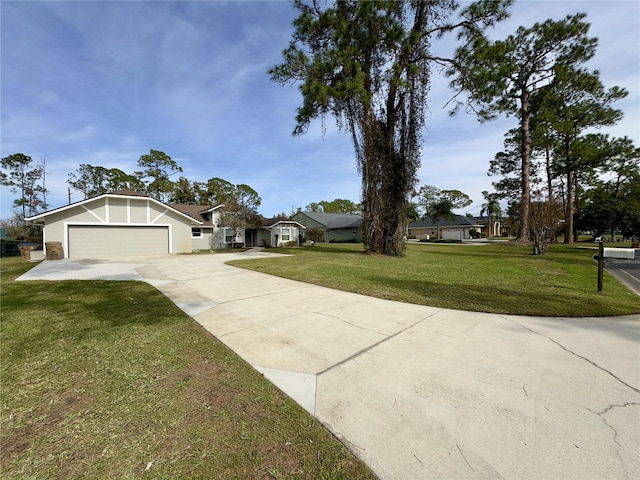 single story home featuring a garage and a front lawn