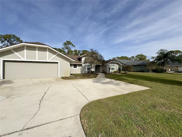 ranch-style house with a garage and a front yard