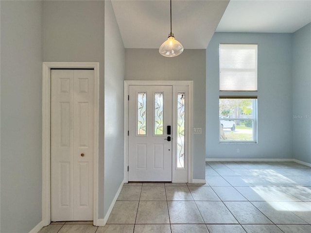 foyer with light tile patterned floors