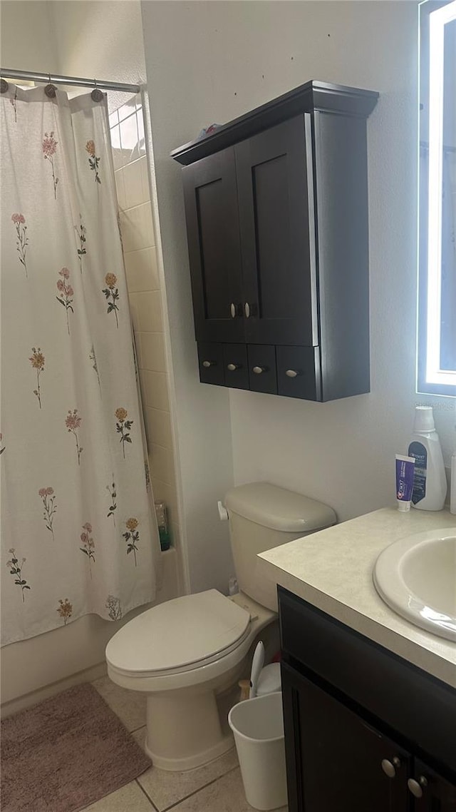 full bathroom featuring vanity, toilet, shower / bath combo, and tile patterned flooring