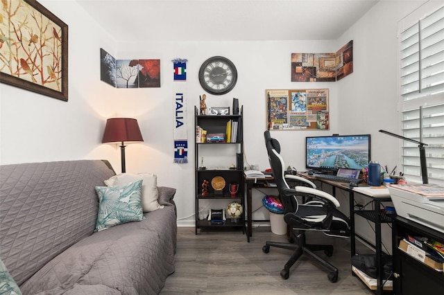 office area with wood-type flooring