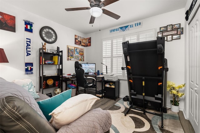 office space featuring wood-type flooring and ceiling fan