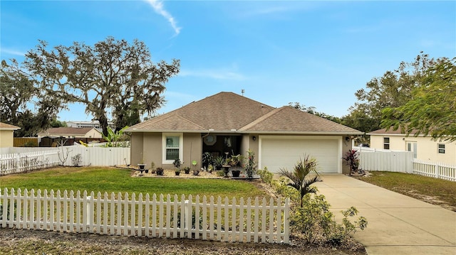 ranch-style home with a front lawn and a garage