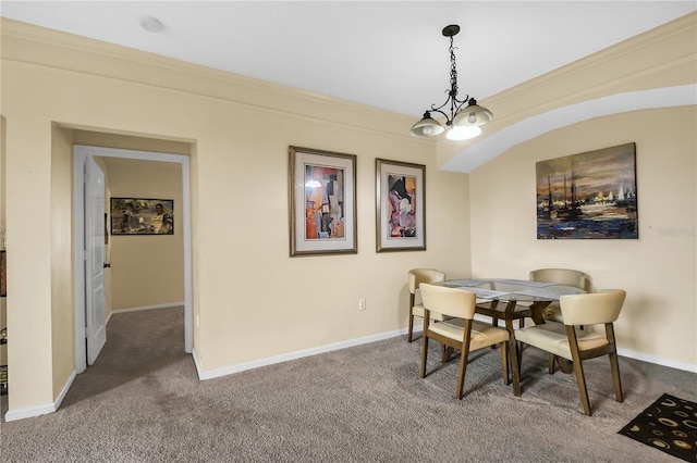 dining room with ornamental molding and carpet flooring