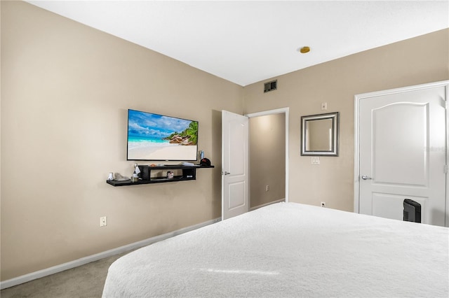 bedroom with light colored carpet