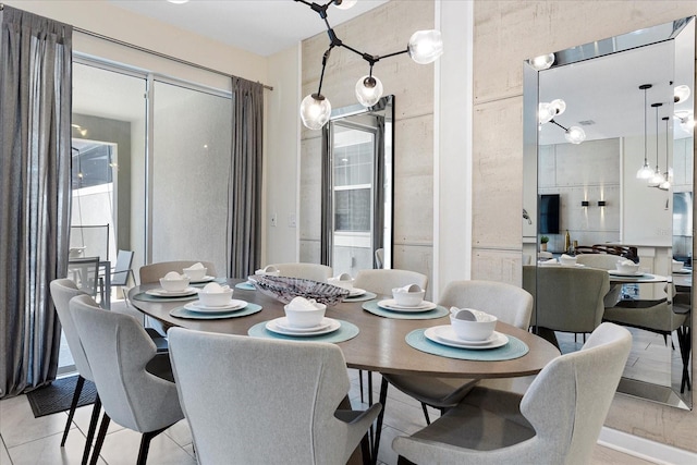 dining room with light tile patterned flooring