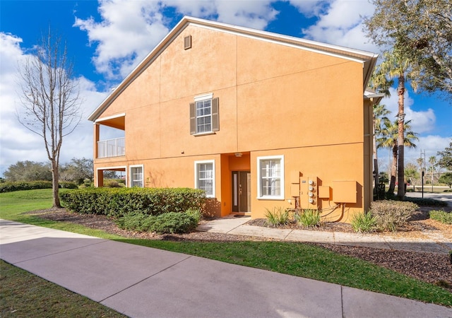 view of front of property featuring stucco siding