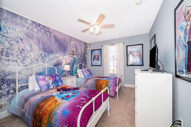 bedroom with baseboards, a ceiling fan, and light colored carpet