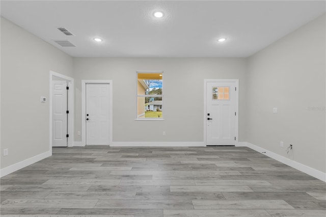 entrance foyer featuring light hardwood / wood-style floors