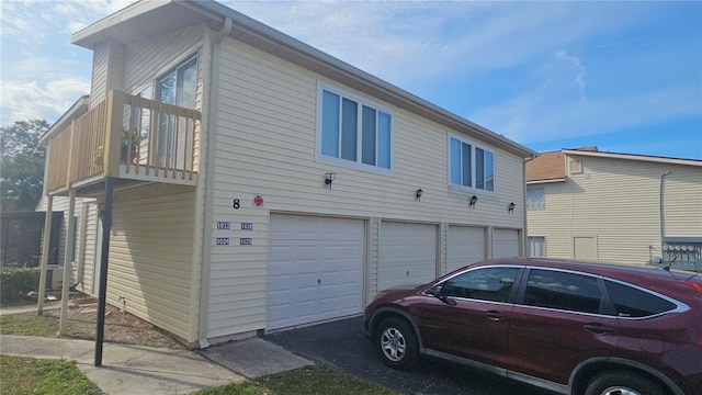 view of property exterior featuring a garage