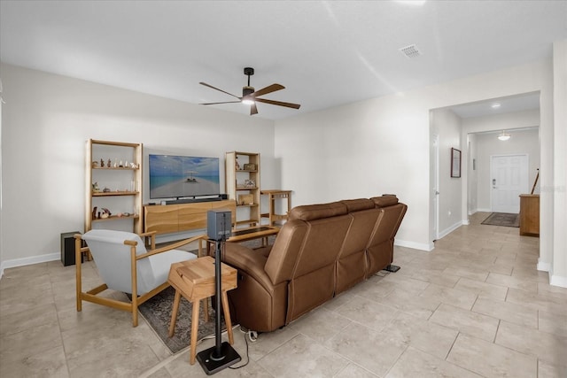 living room featuring ceiling fan