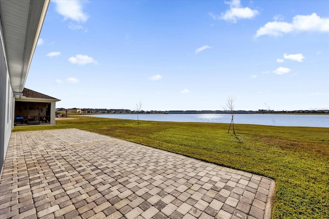 view of patio featuring a water view