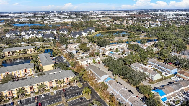 drone / aerial view with a water view