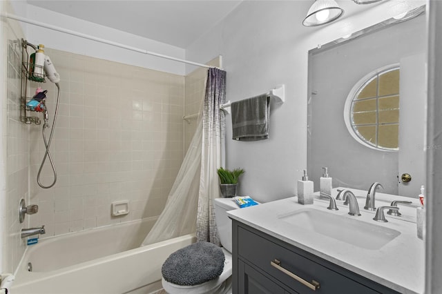 full bathroom featuring toilet, vanity, and shower / tub combo