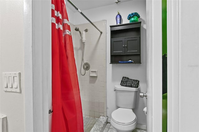 bathroom with toilet and walk in shower