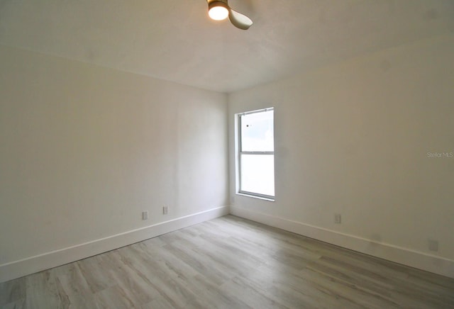 spare room featuring light hardwood / wood-style flooring