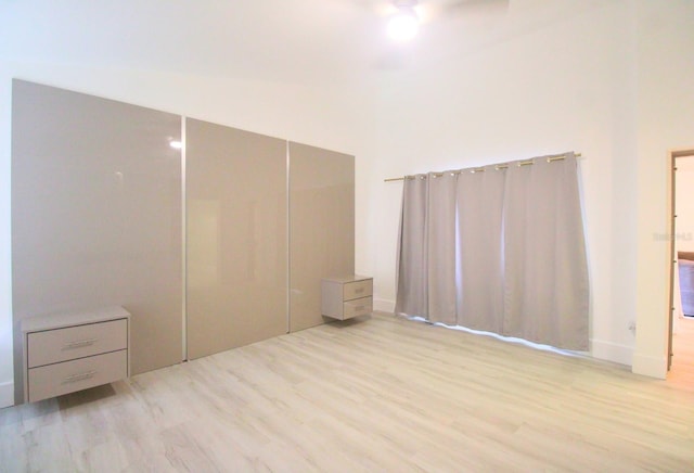 unfurnished bedroom with light hardwood / wood-style floors